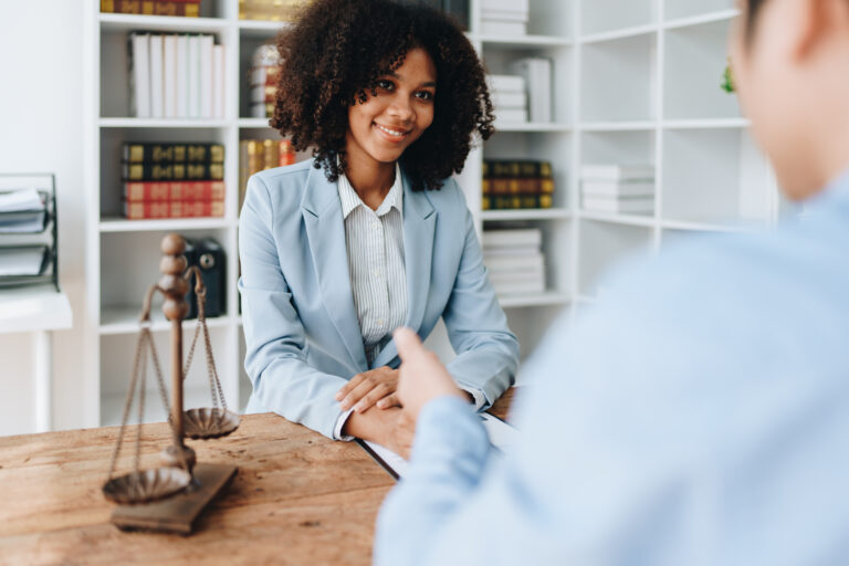 African American Attorney Discussing a Business Agreement At Law Firm